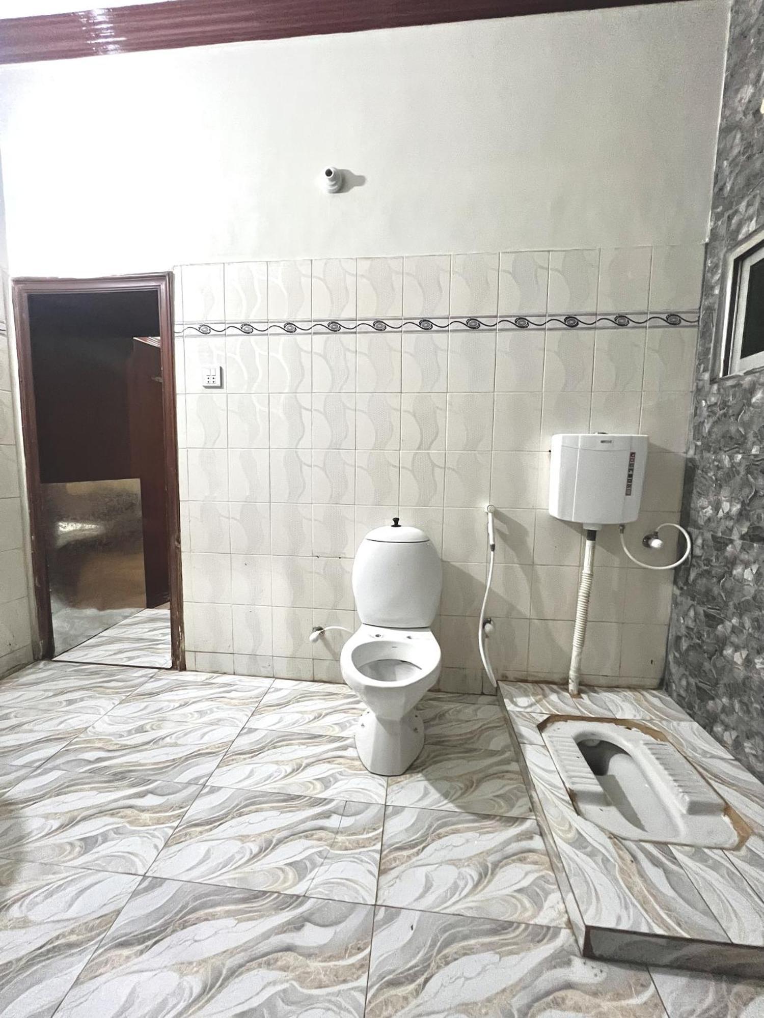 Hotel Babar House à Faisalabad Extérieur photo