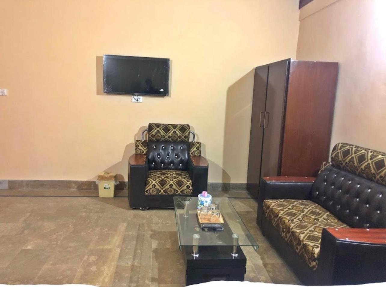 Hotel Babar House à Faisalabad Extérieur photo