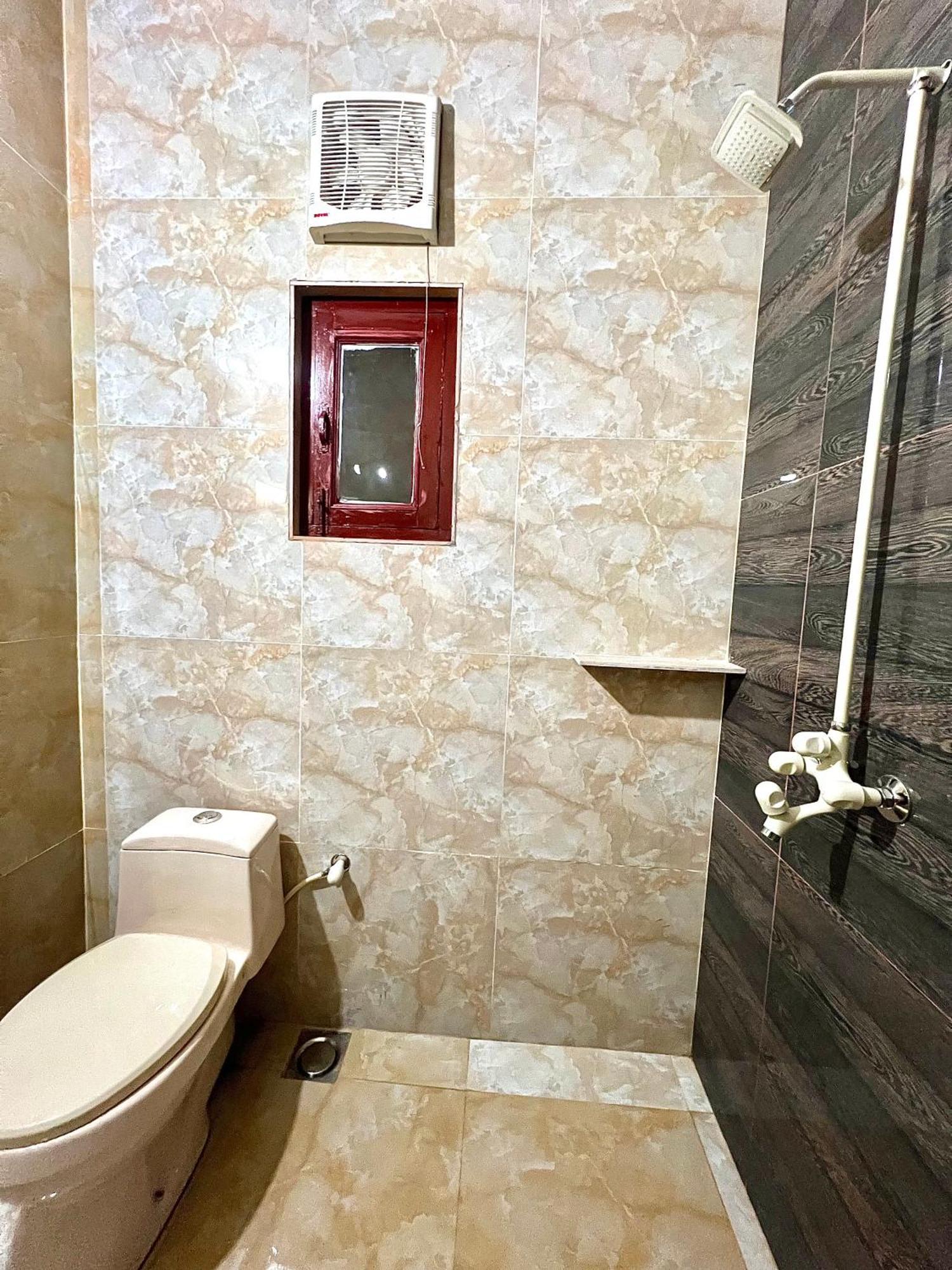 Hotel Babar House à Faisalabad Extérieur photo